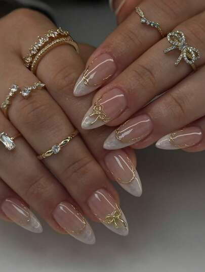 Gradient Gold Bow Almond French Nails